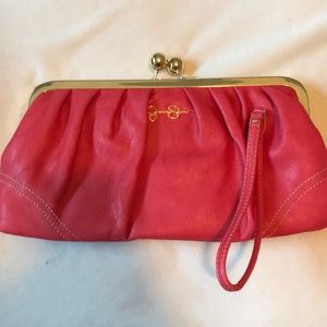 Jessica Simpson coral bow clutch